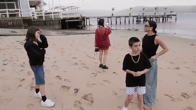 Kourtney with her kids Penelope and Reign in Sydney