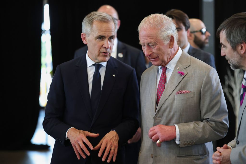 Mark Carney speaking to King Charles