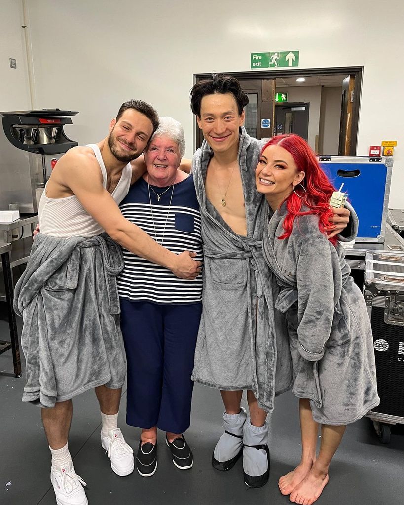 Joe Sugg's grandmother poses with Vito Coppola, Carlos Gu and Dianne Buswell