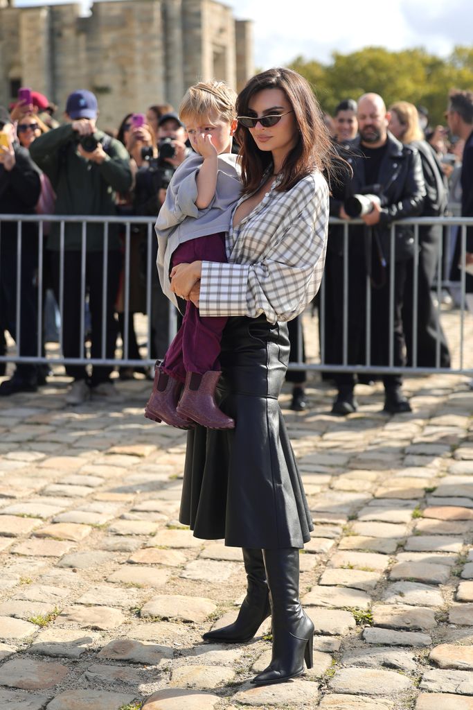 Emily Ratajkowski and Sylvester Apollo Bear attend the Loewe Paris Womenswear Spring-Summer 2025 show as part of Paris Fashion Week on September 27, 2024 in Paris, France. (Photo by Jacopo Raule/Getty Images)