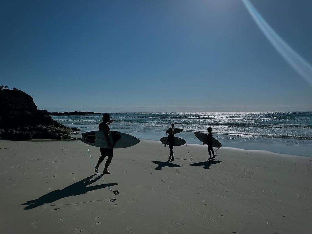 Chris Hemsworth shares photos from a day of surfing with his sons Tristan and Sasha, posted on Instagram