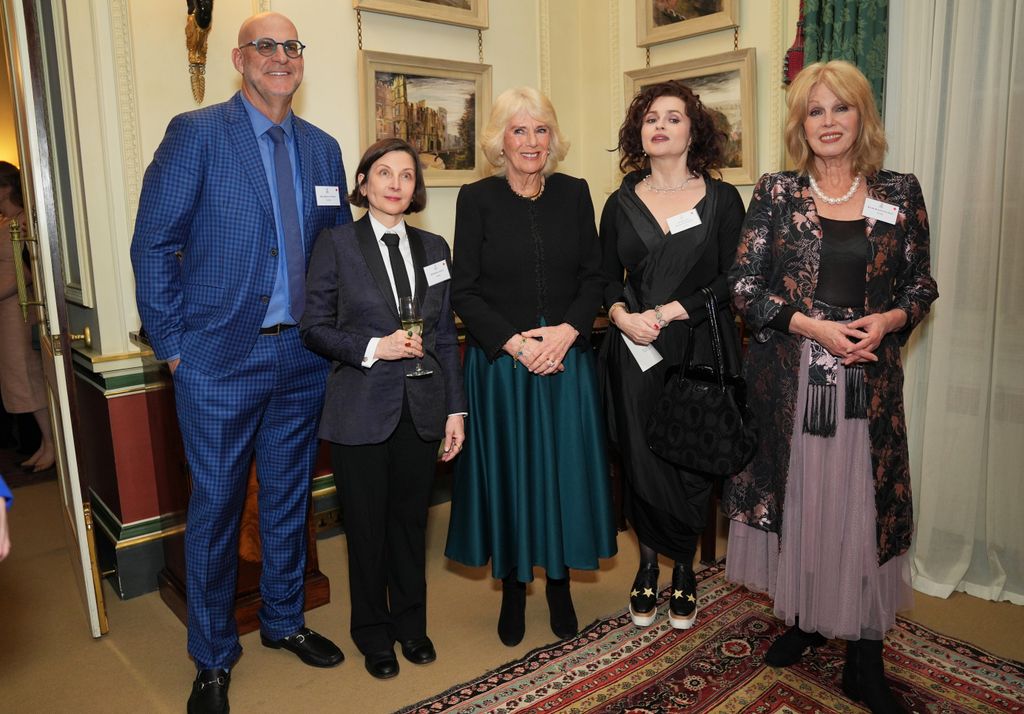 Harlan Coben, Donna Tartt, Queen Camilla, Helena Bonham Carter and Dame Joanna Lumley during a reception for The Queen's Reading Room charity