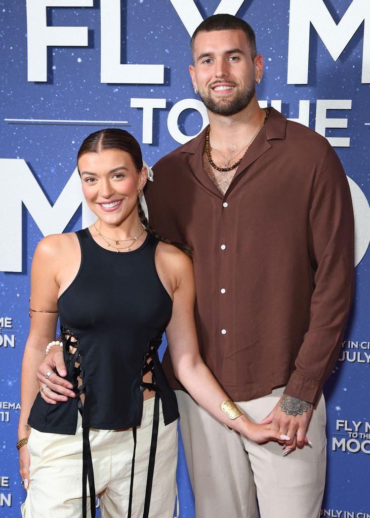 Molly Marsh and Zacharian Noble at a premiere