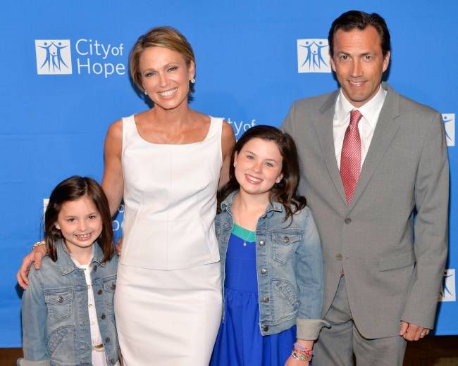 Amy Robach with her daughters and Andrew Shue