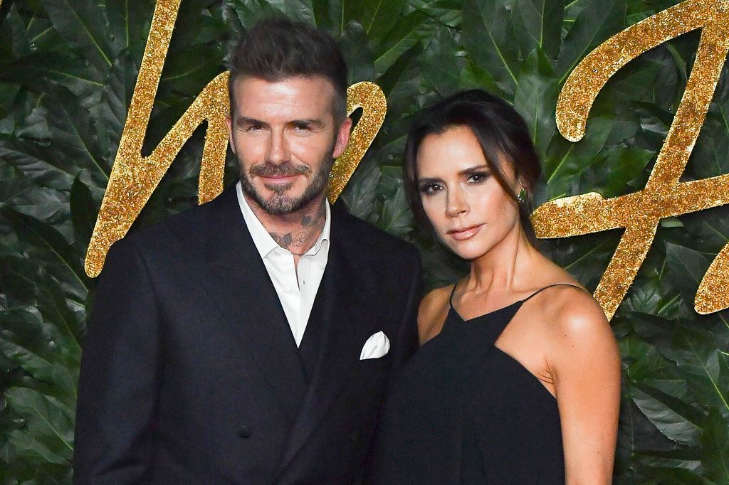 David and Victoria Beckham in black outfits