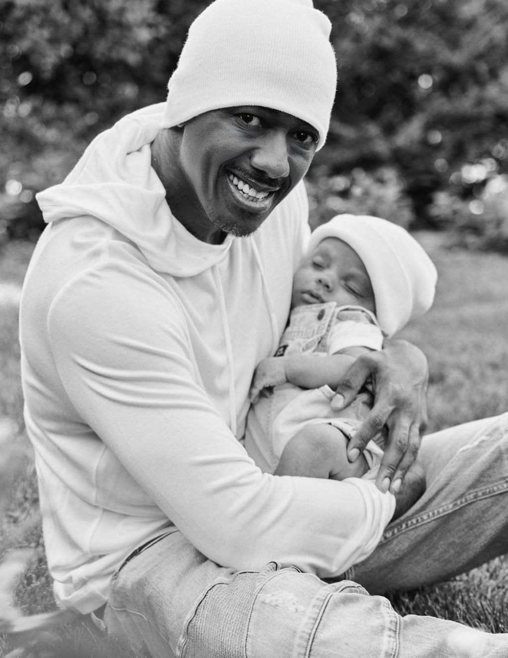 Nick Cannon holding his late son Zen