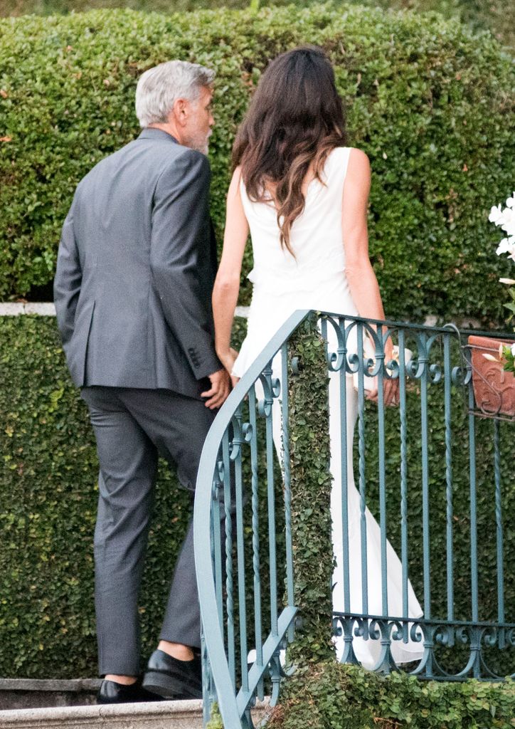 Amal Clooney onned a bridal-like gown as she arrived for her dinner date in Italy