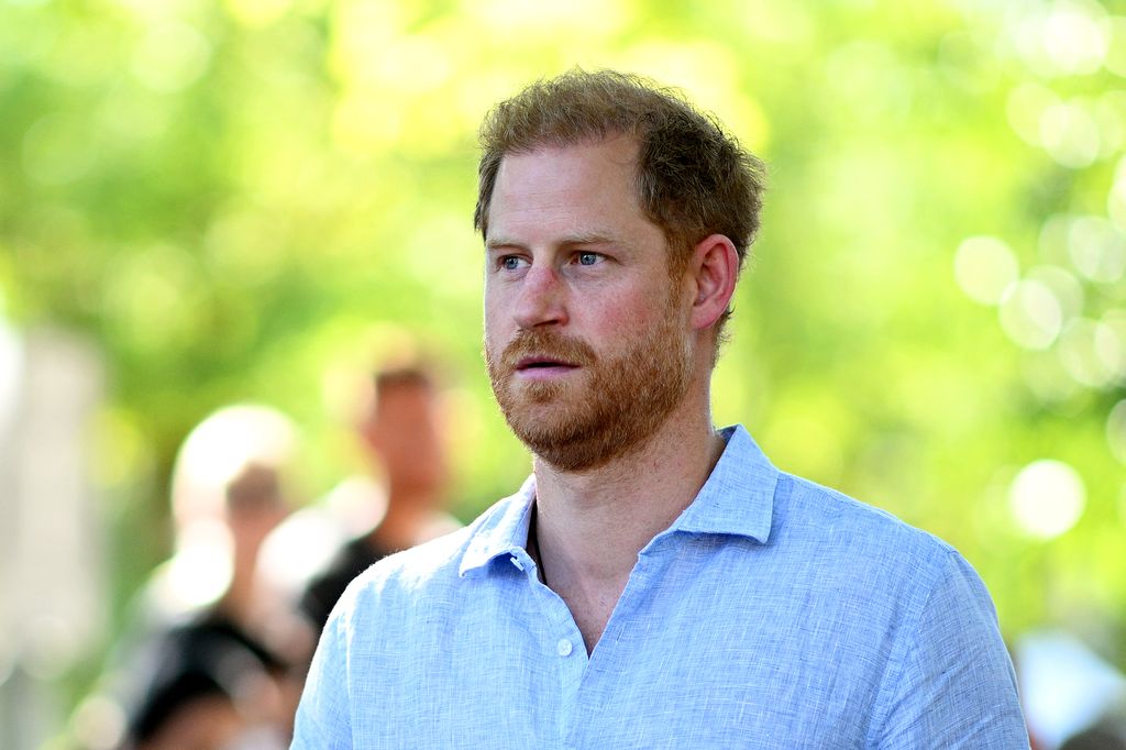 Prince Harry in Dusseldorf with trees in background