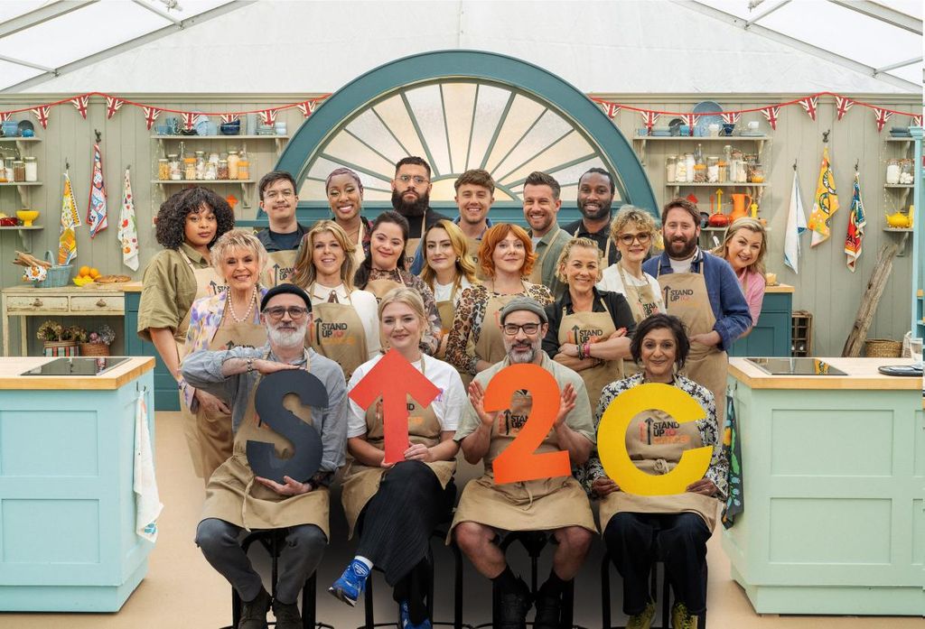 A group of people huddled together in bake off tent