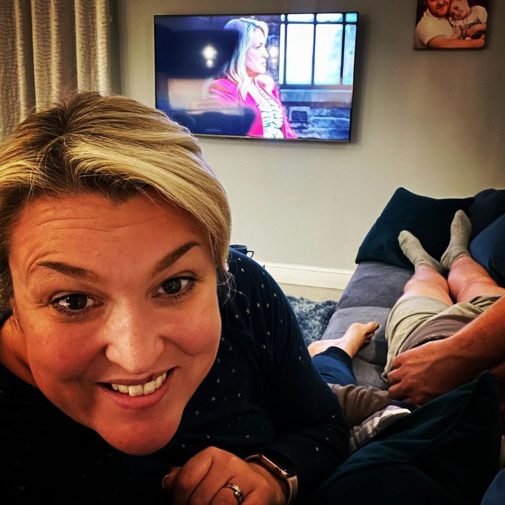 Sara Davies takes selfie on sofa at home in Newcastle