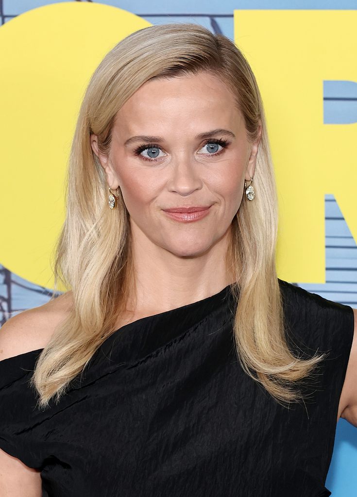 Reese Witherspoon wearing a black dress