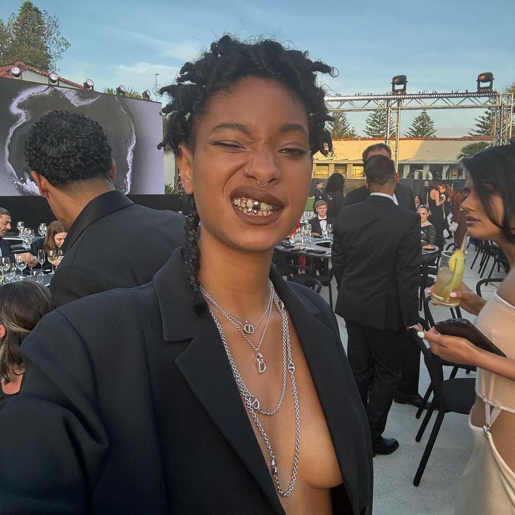 Willow Smith sporting her rose gold grillz 