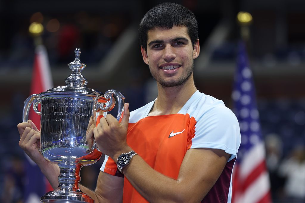 Carlos Alcaraz of Spain celebrates with the winners trophy after defeating Casper Ruud of Norway during their Menâs Singles Final match on Day Fourteen of the 2022 US Open at USTA Billie Jean King National Tennis Center on September 11, 2022 in the Flushing neighborhood of the Queens borough of New York City