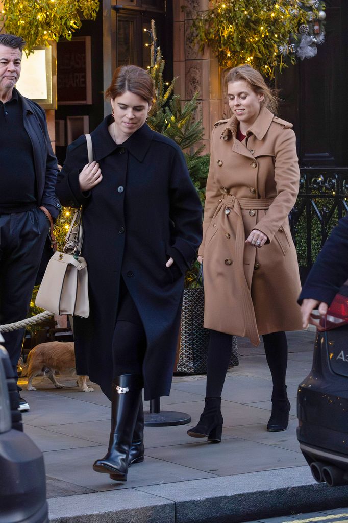 Princess Beatrice and Princess Eugenie on street in coats