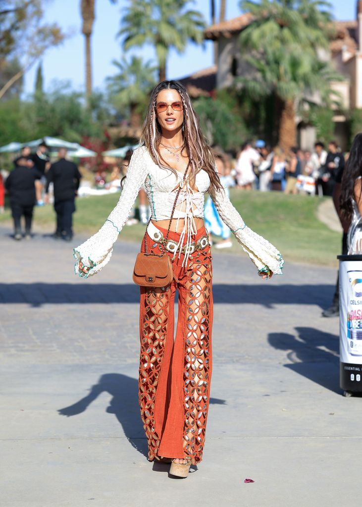 Alessandra Ambrosio wearing a Concho belt to Coachella in 2023