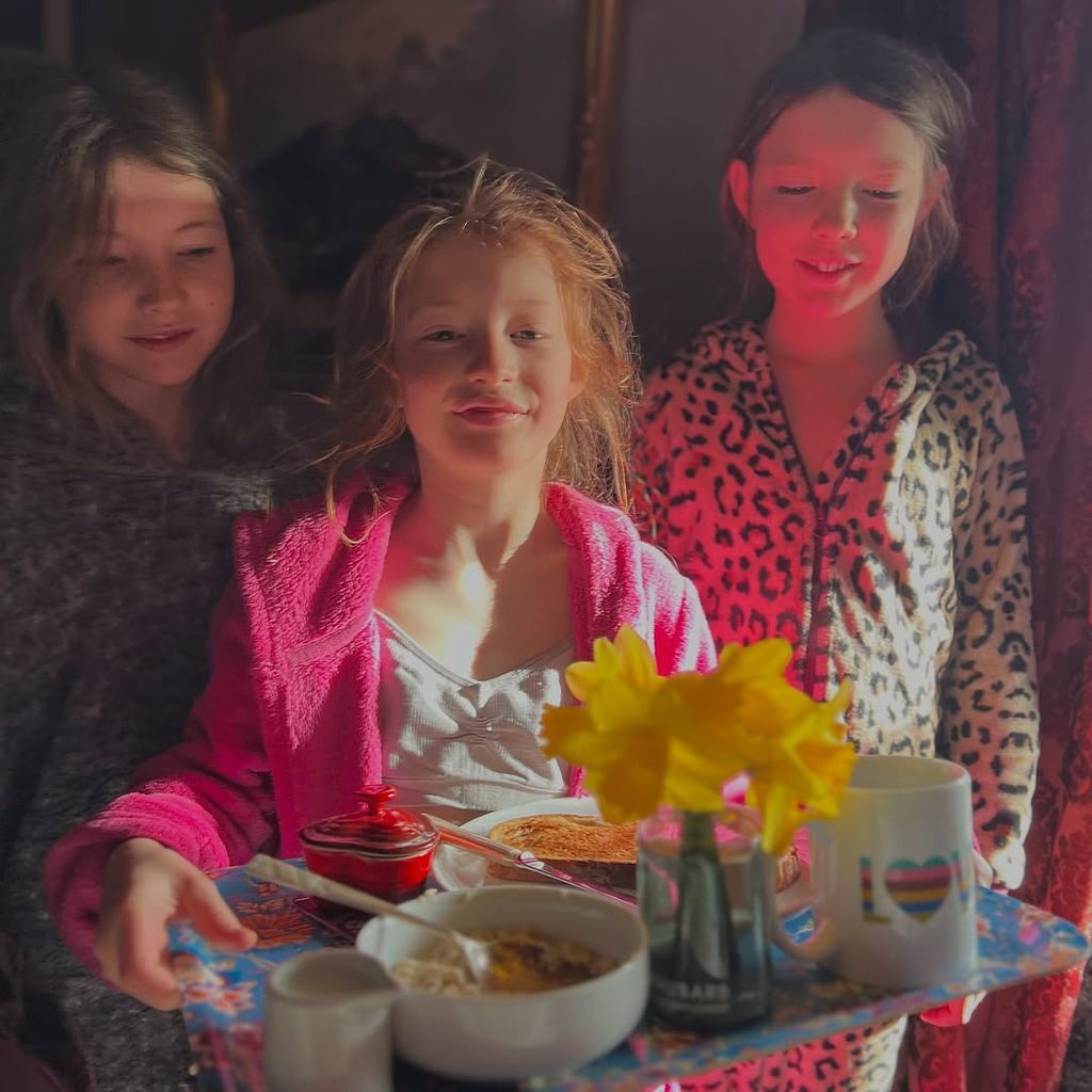 Amanda Owen's children presenting her with tray of breakfast on Mother's Day