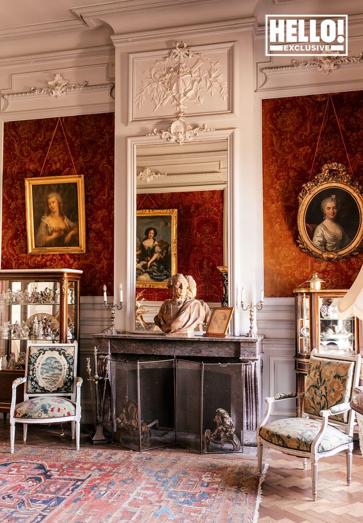 Baron Arnaud De Bastard's artwork and fireplace at Chateau de Saint-Denis