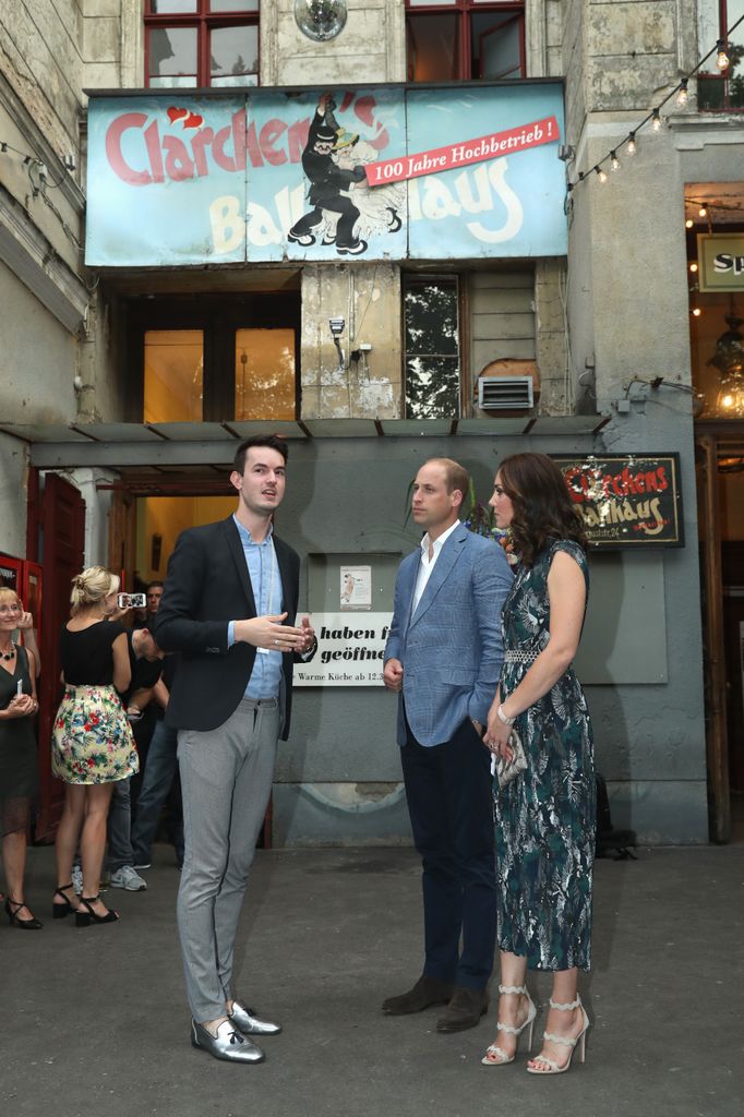 Kate and William talking to a man