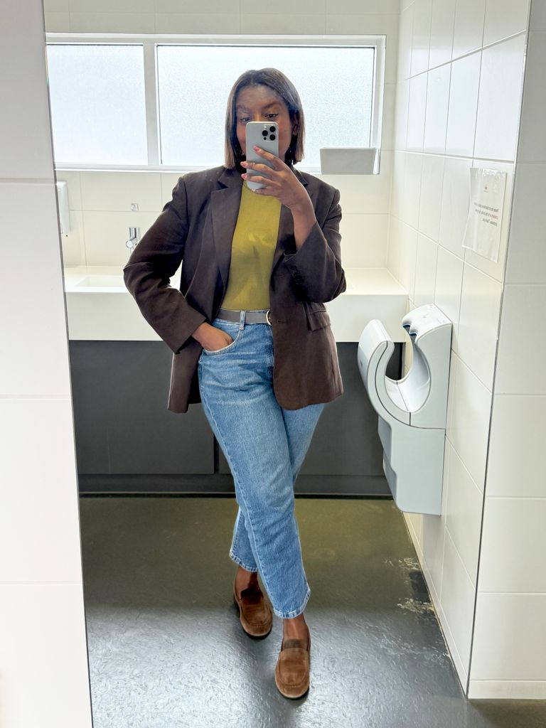 woman taking a selfie in a mirror