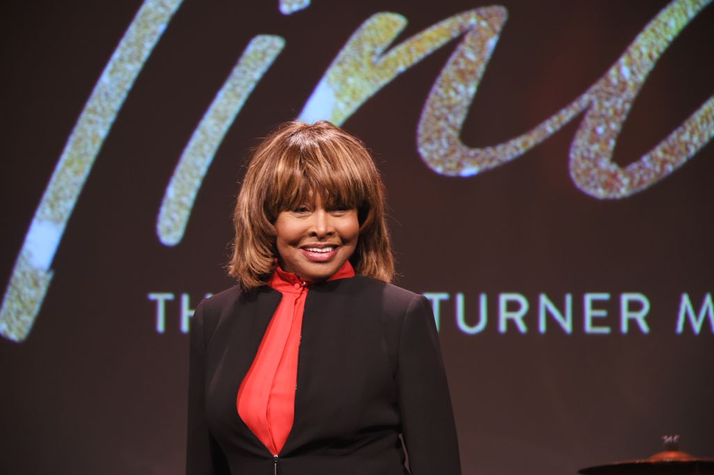 Tina Turner poses at a photocall for "Tina: The Tina Turner Musical" at The Hospital Club on October 17, 2017 in London, England