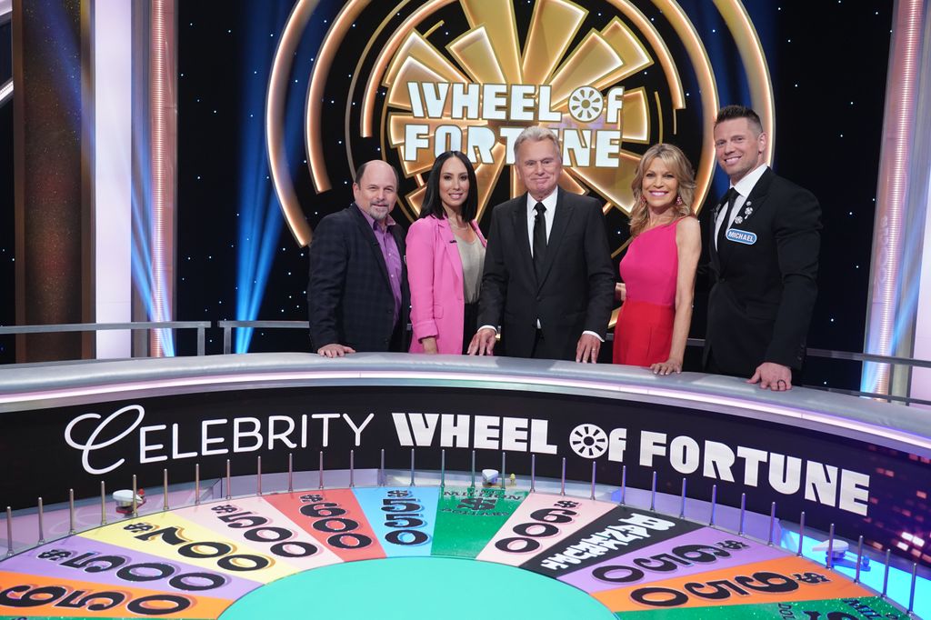 Jason Alexander, Michael Mizanin and Cheryl Burke  Celebrity Wheel of Fortune