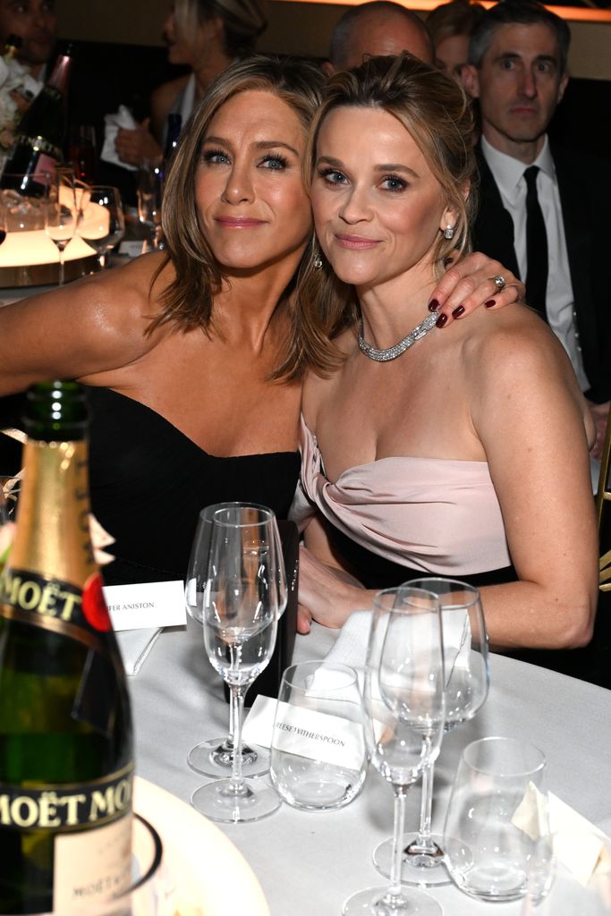 Jennifer Aniston and Reese Witherspoon enjoy MoÃ«t & Chandon at 81st Annual Golden Globes, celebrating 13 years of Toast for a Cause at the Beverly Hilton on January 7, 2023.