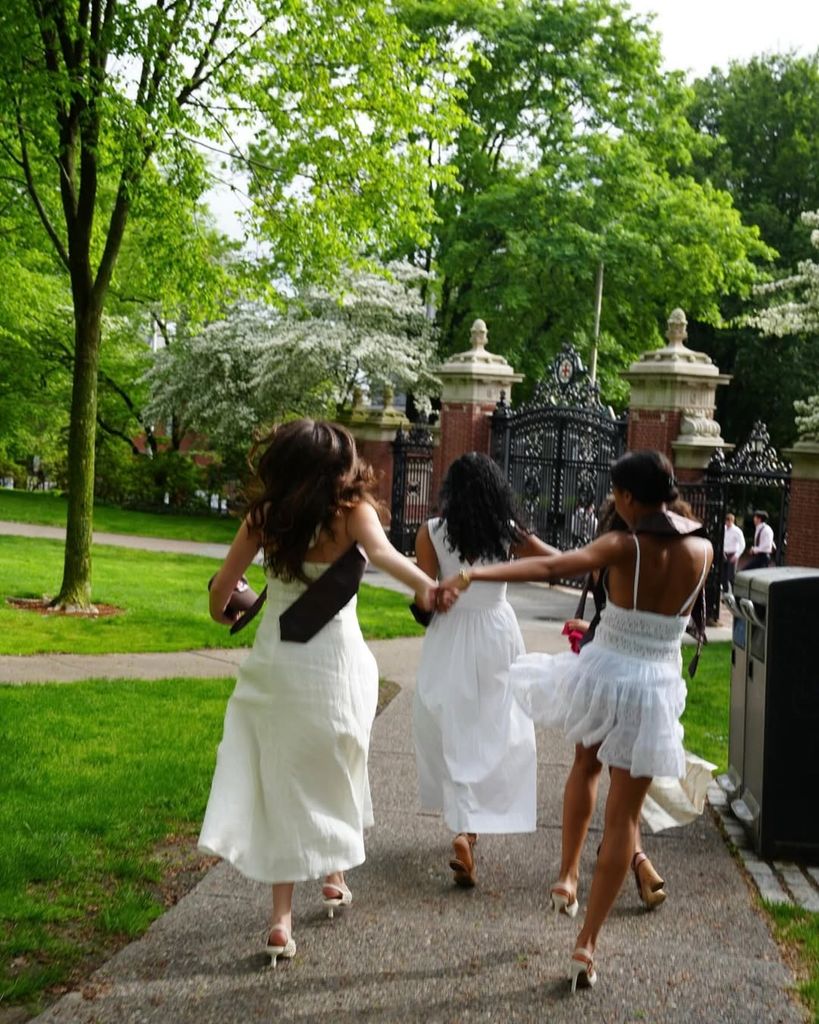George and Ali's daughter Elliott on her graduation day with her friends 