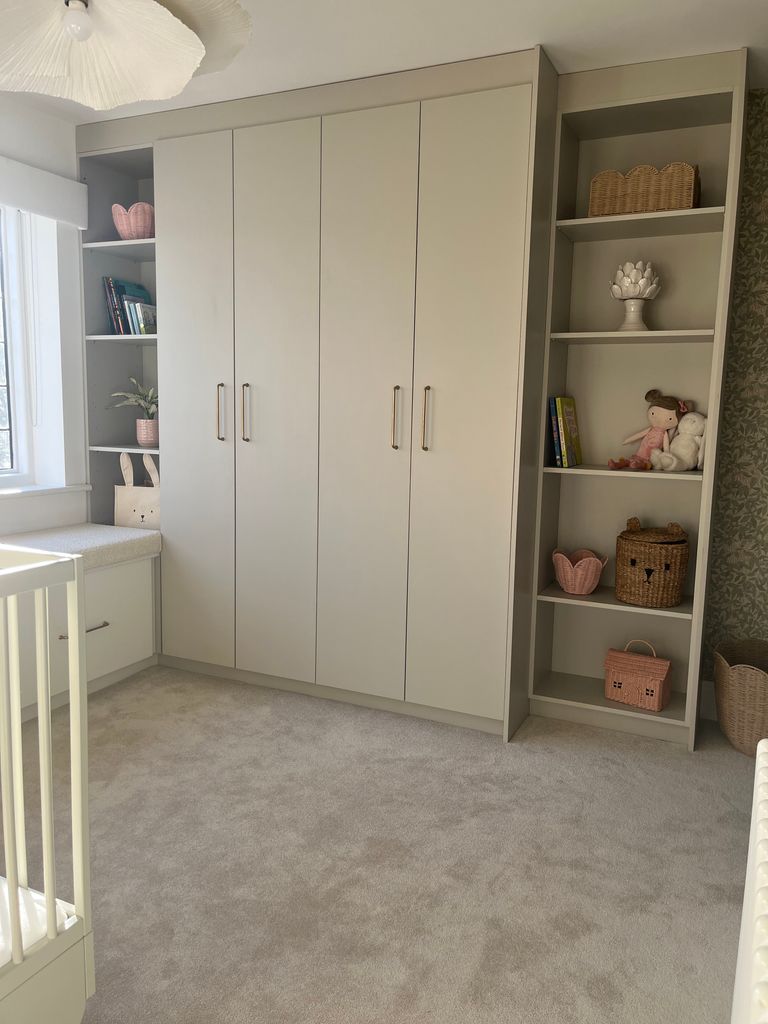 child's bedroom with double wardrobe and shelving