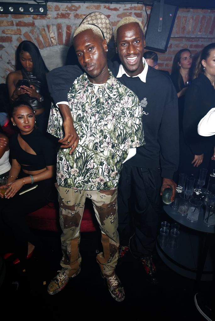 Kevin Bonsu and Karlon Bonsu aka The Flag Twins attend the launch party of Dear Darling in Mayfair on December 7, 2023 in London, England. (Photo by Dave Benett/Getty Images for Dear Darling)