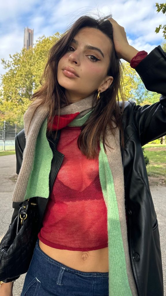 emily ratajkowski in a red knit top