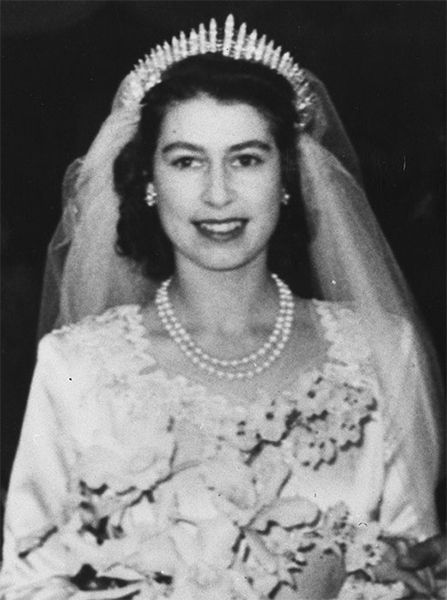 queen wearing tiara on wedding day