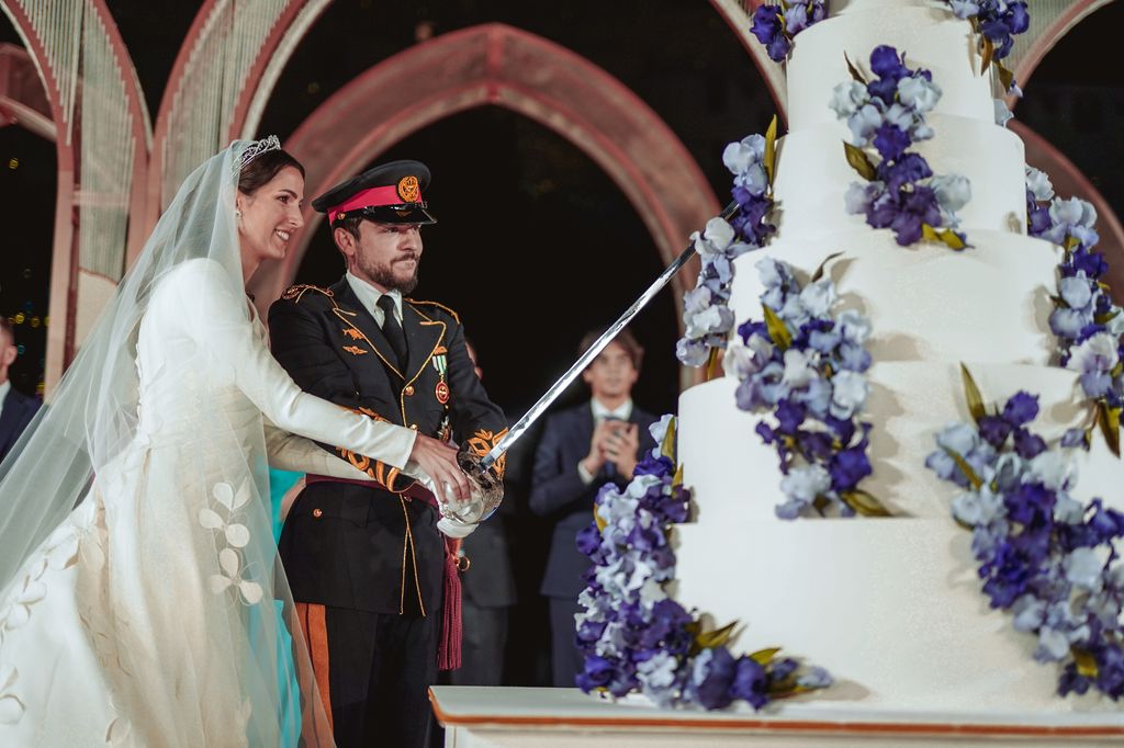 Prince Hussein and Princess Rajwa with their seven-tier royal cake