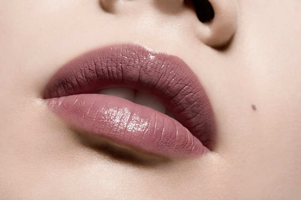 a close up image of lips with pink lipstick
