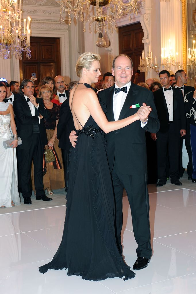 Princess Charlene of Monaco wears a black backless gown