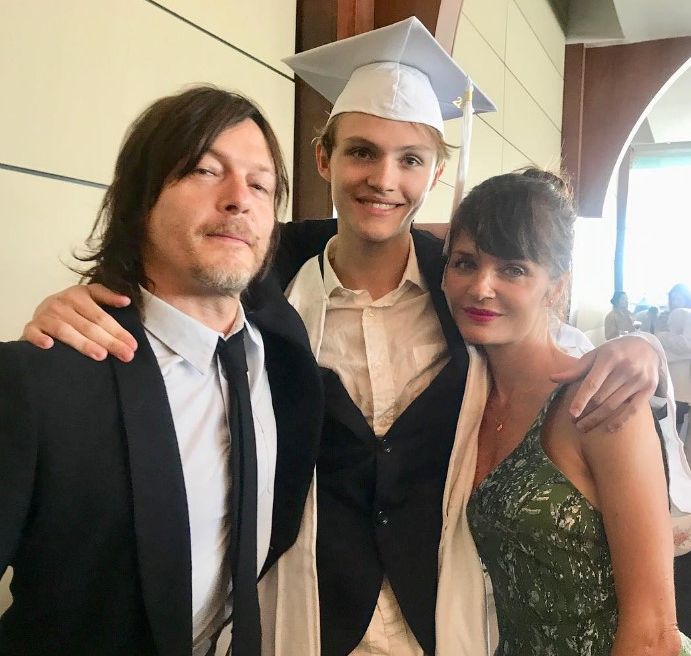 norman reedus posing with son mingus and ex helena christensen in 2018