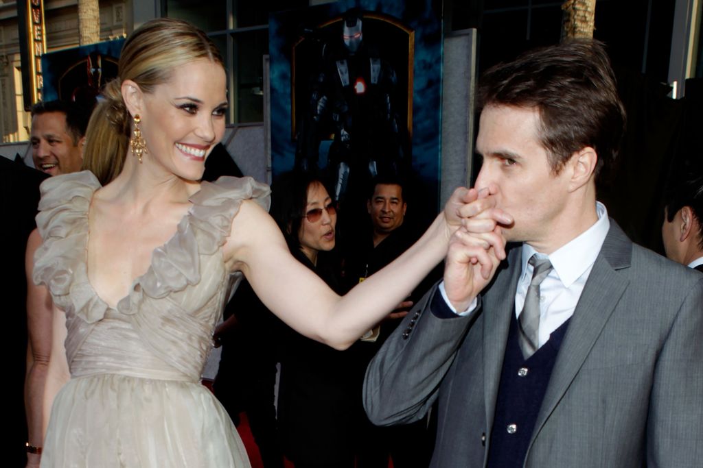 Leslie Bibb and Sam Rockwell arrive at the "Iron Man 2" World Premiere at El Capitan Theatre on April 26, 2010 in Hollywood, California