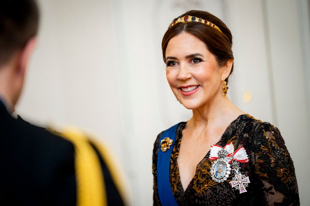 Queen Mary of Denmark smiles during a gala dinner at the Presidential Palace in Helsinki, Finland, on March 4, 2025 during a 2-day state visit of the Danish royal couple to Finland.