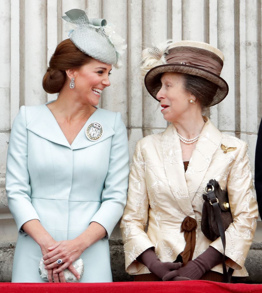 Kate Middleton laughing with Princess Anne on palace balcony