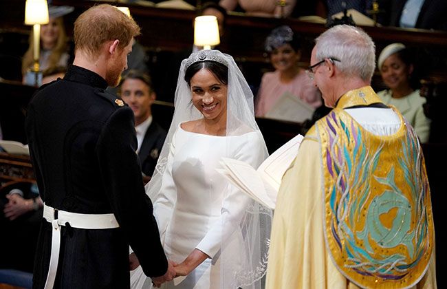 meghan markle smiles justin welby