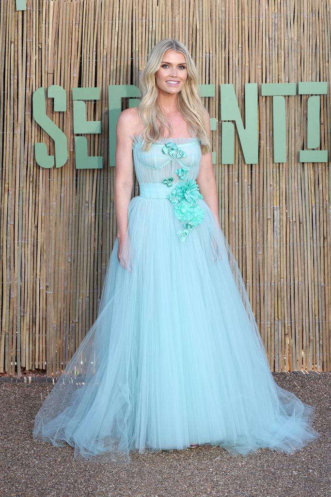 Lady Kitty Spencer posed in blue dress