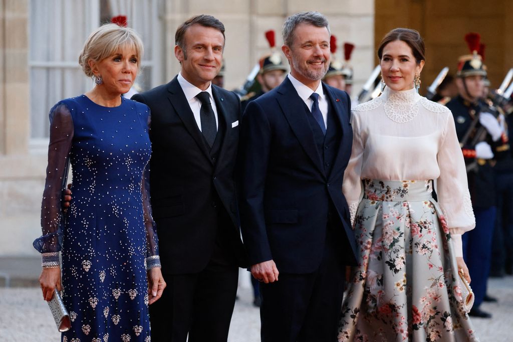 France's President Emmanuel Macron (2nd L) and his wife Brigitte Macron (L) welcome King Frederik X (2nd R) and Queen Mary of Denmark (R) for a state dinner