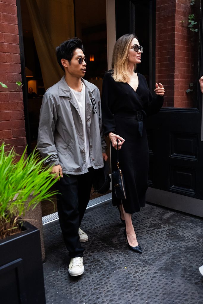 Pax Jolie Pitt (L) and Angelina Jolie are seen in SoHo 