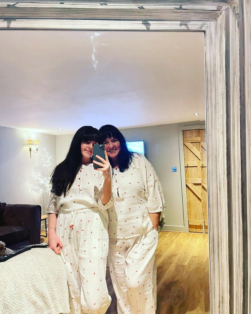 Coleen and Ciara posing for a mirror selfie at home 