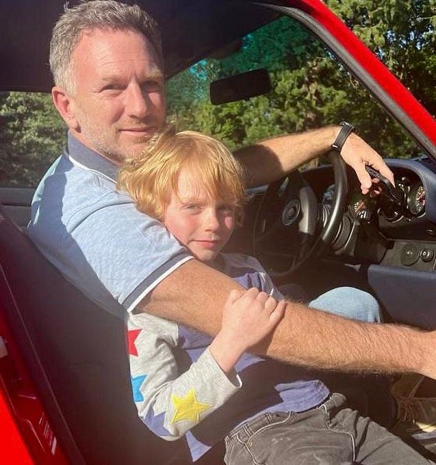 Christian Horner sitting in car with son Monty 