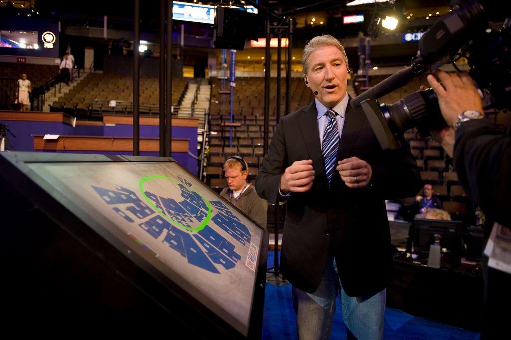 CNN anchor John King works with the "Magic Wall" in CNN's workspace on the floor of the 2008 Democratic National Convention in Denver
