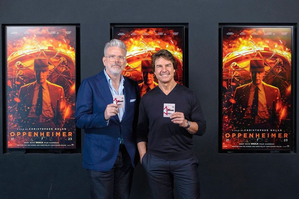 Tom Cruise holds a ticket for Christopher Nolan's "Oppenheimer"