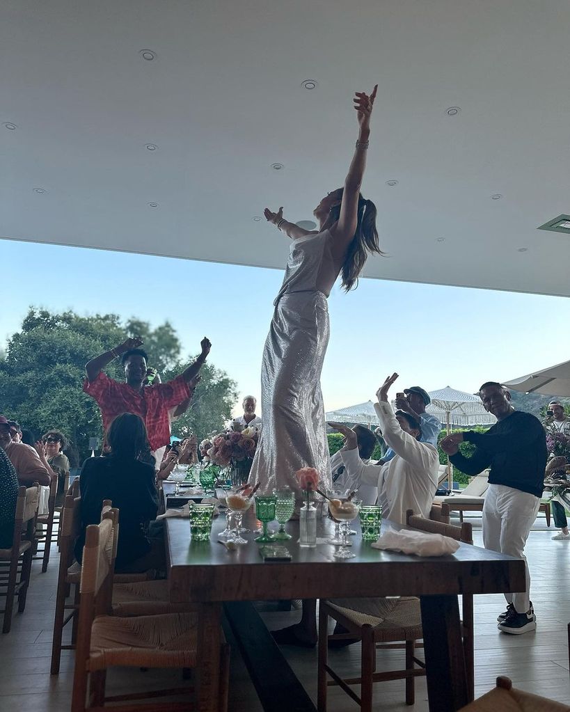 Jennifer Lopez dancing on a table during her birthday celebrations