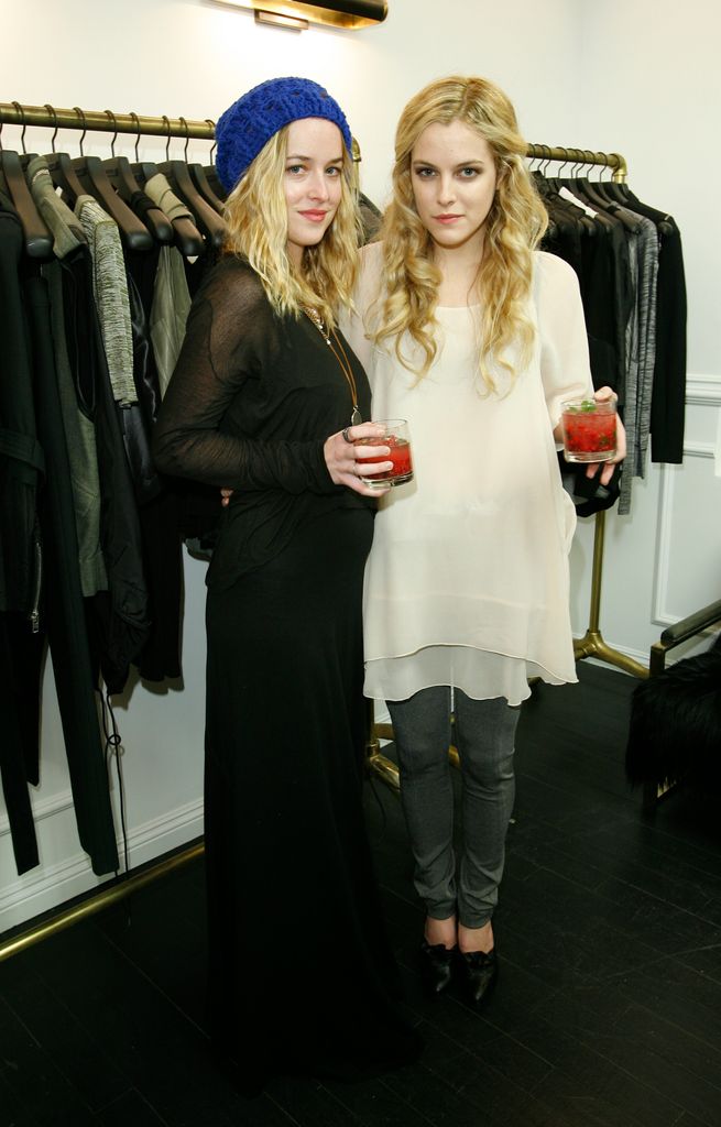 Dakota Johnson (L) and Riley Keough attend a Dinner Party hosted by Opening Ceremony L.A. in honor of Alexander Wang's new sunglasses collection, 2010