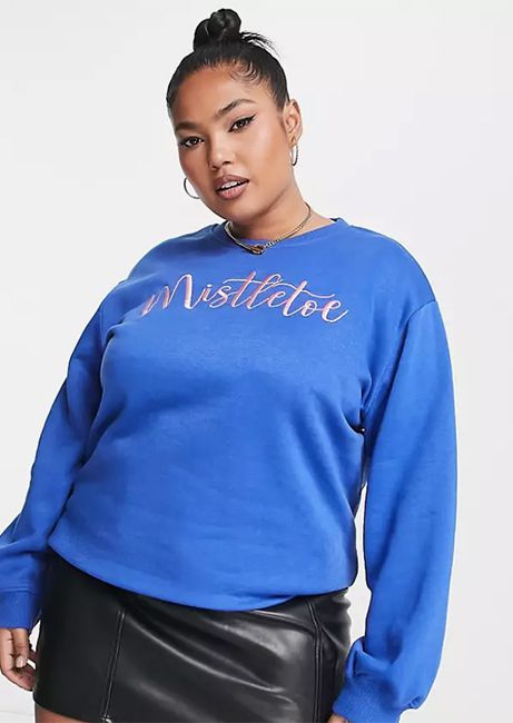 model wearing plus size blue mistletoe slogan jumper