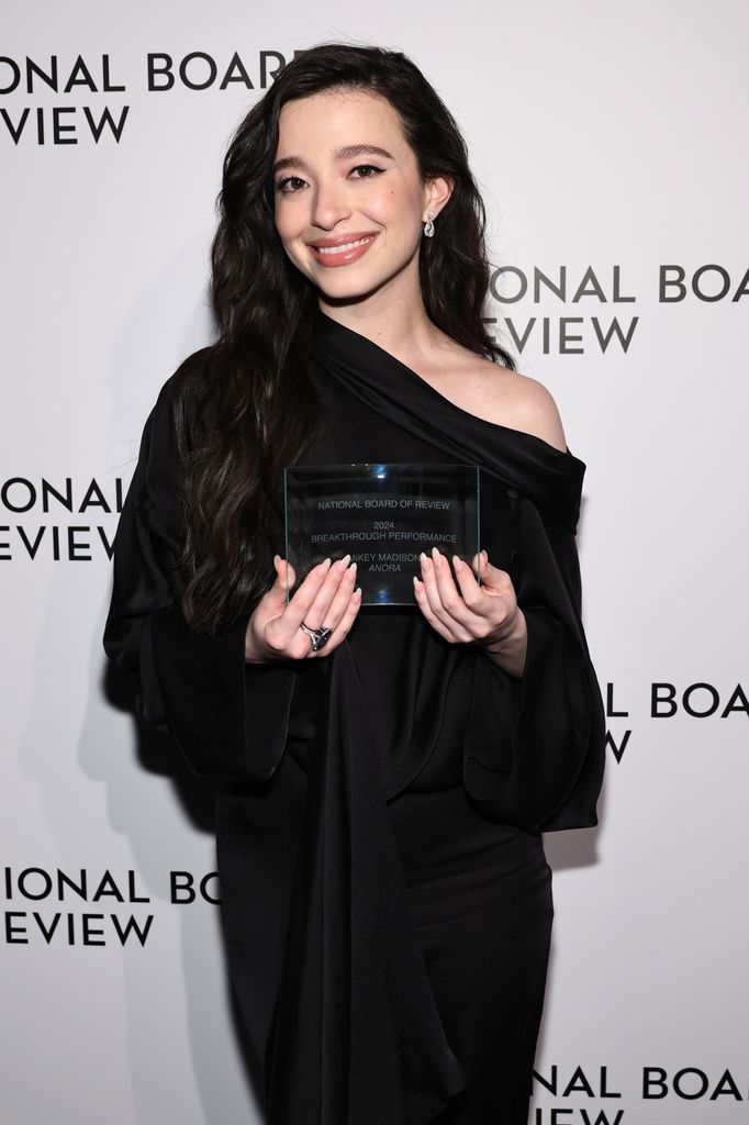 Mikey Madison poses with the Breakthrough Performance Award for "Anora" during The National Board of Review Annual Awards Gala at Cipriani 42nd Street on January 07, 2025 in New York City.